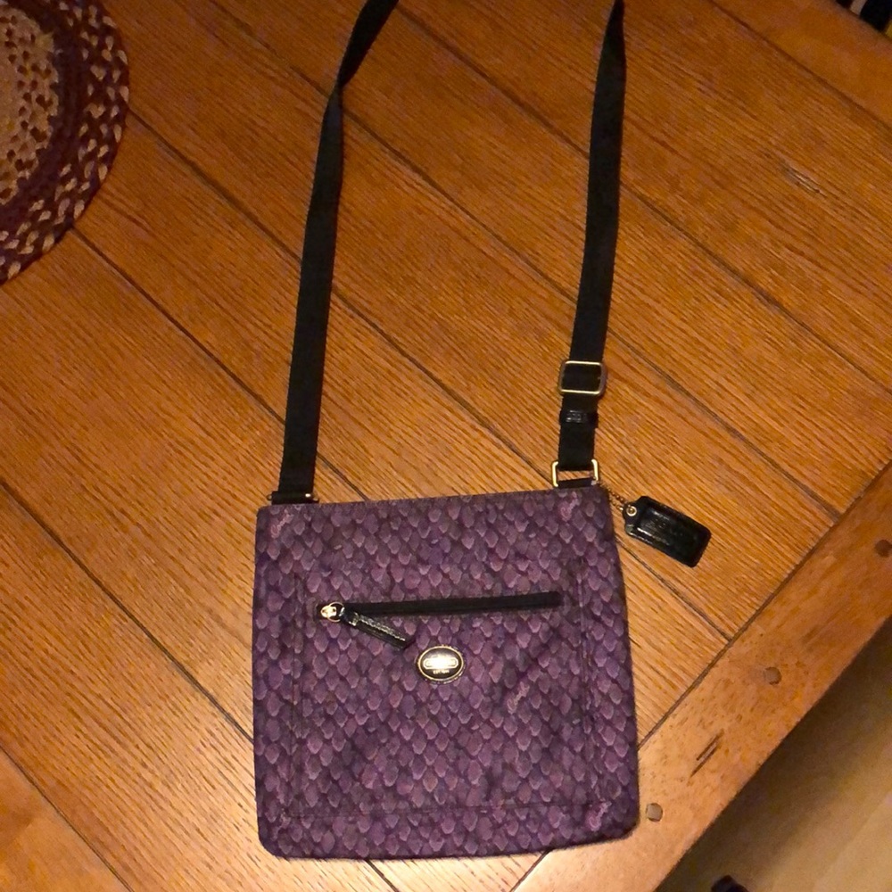 Coach crossbody purse.